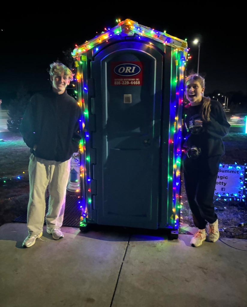 The illuminated Magic Potty decorated with holiday lights